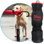 A dog holding a red umbrella in its mouth while wearing a black boot. To its left is a Rugged-X boot featuring the MediPaw brand.