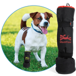A dog on a grassy field while wearing a black boot. To its left is a Soft Bandage boot featuring the MediPaw brand.